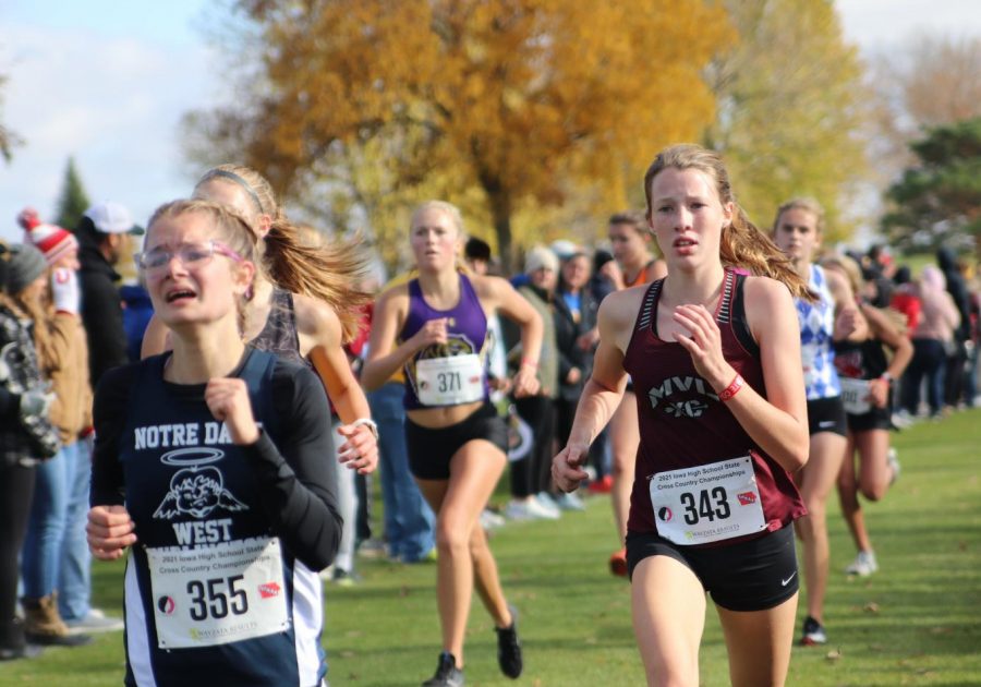 Freshman Abbie Moss crosses the state finish line in Fort Dodge Oct. 28.