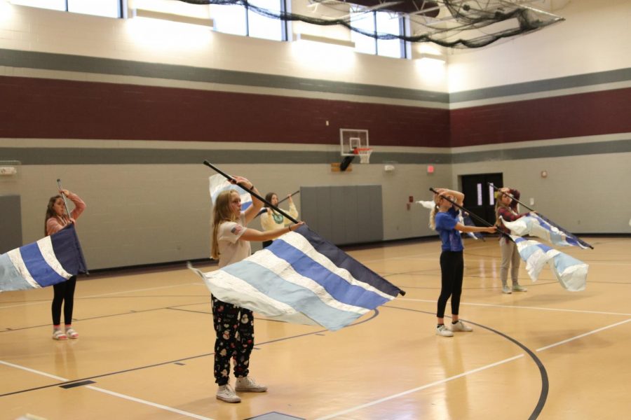 The Winter Guard practicing their routine.