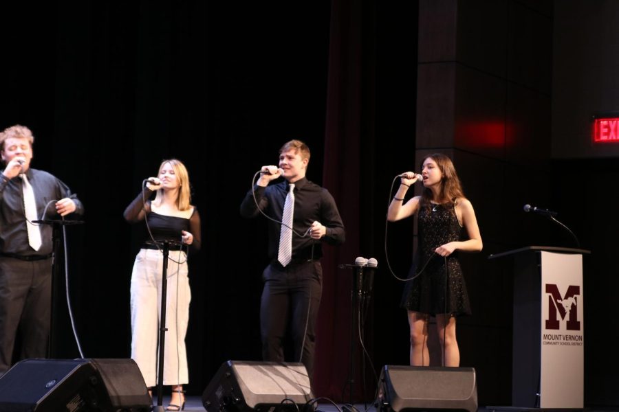 Juniors Trystin Lashley, Abbie Morf, Ty Panos, and Sophomore Charlie Krob perform at State Jazz on Feb. 7.