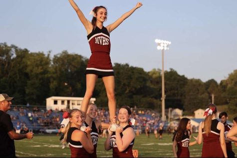 Kambree Hultquist is held up for a stunt