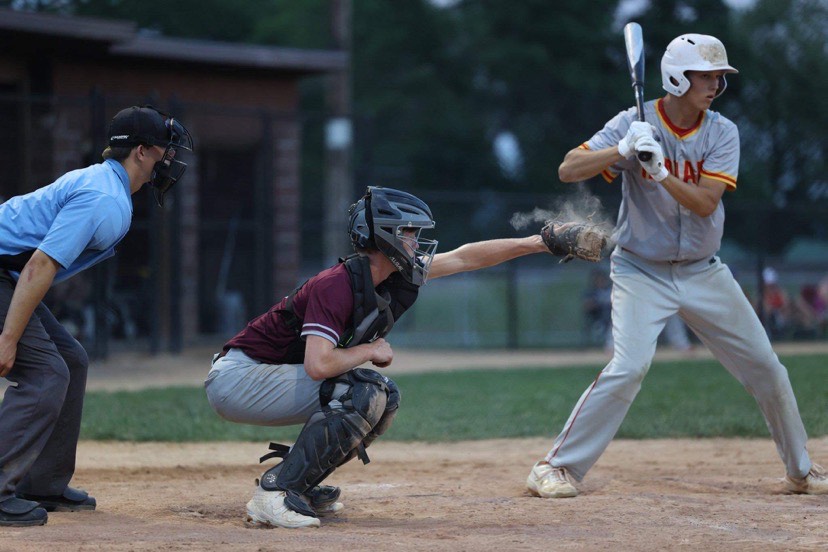 Dawson Fluharty catches a strike in a game against Marion the Mustangs would win 11-7 July 5.