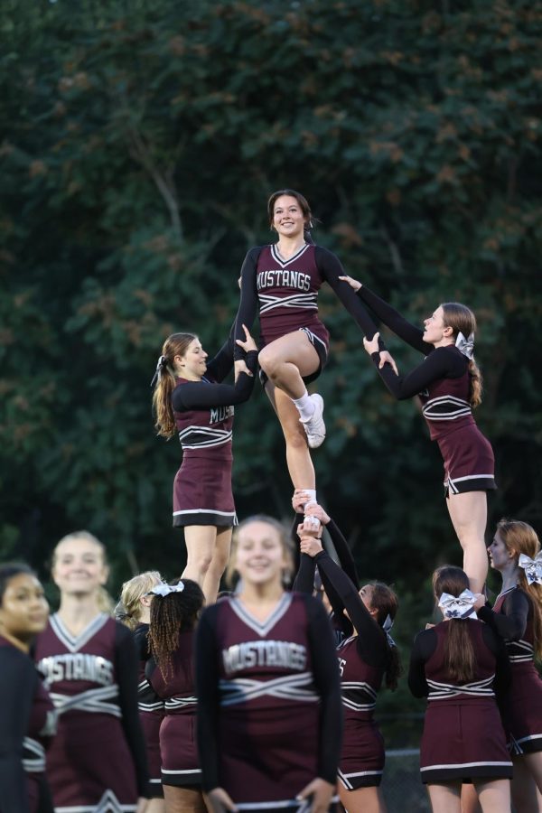 Senior va Dimmer tops the lib pyramid Sept. 22 after being crowned Homecoming queen.