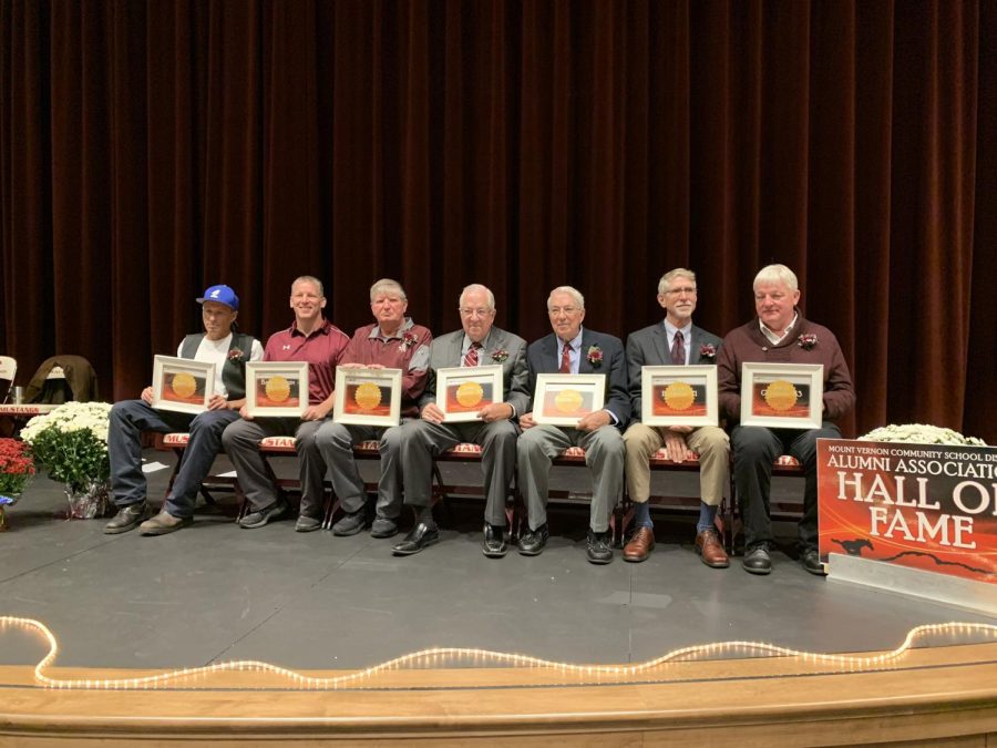 The 2022 Hall of Fame recipients pose with their newly received awards.