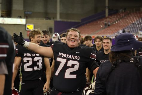 Senior Trystin Lashley (72) smiles in shock after winning the 3A Semifinal game against the Humboldt Wildcats 14-6. The Mustangs will play the Harlan Cyclones next Friday at 1 pm at the UNI-Dome.