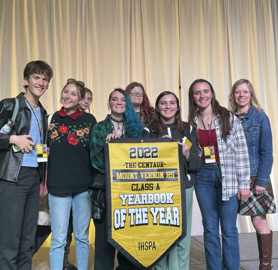 2023 Yearbook Squad stands on stage at IHSPA Conference, Oct. 20.