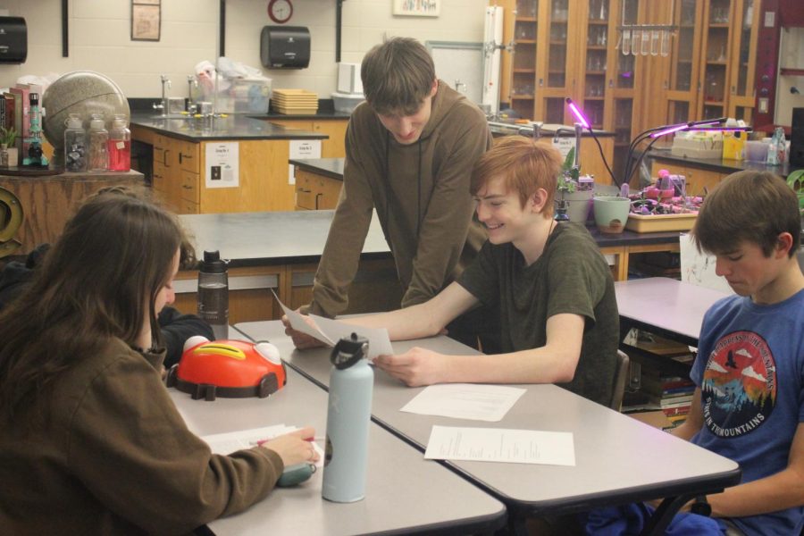 A group of students work on a SiFi J-Term project.