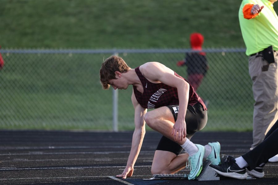 Senior Jensen Meeker seconds before setting a meet record of 49.44 in the 400 meter dash.