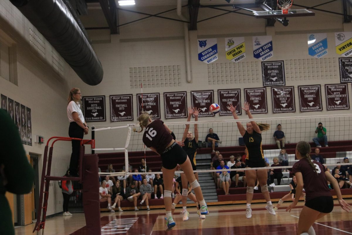 Junior Chloe Meester hits the ball for a point during the Shirley Ryan Invitational on Sept. 2nd. The Mustangs beat Waverly-Shell Rock 2-0 (21-11, 21-2)