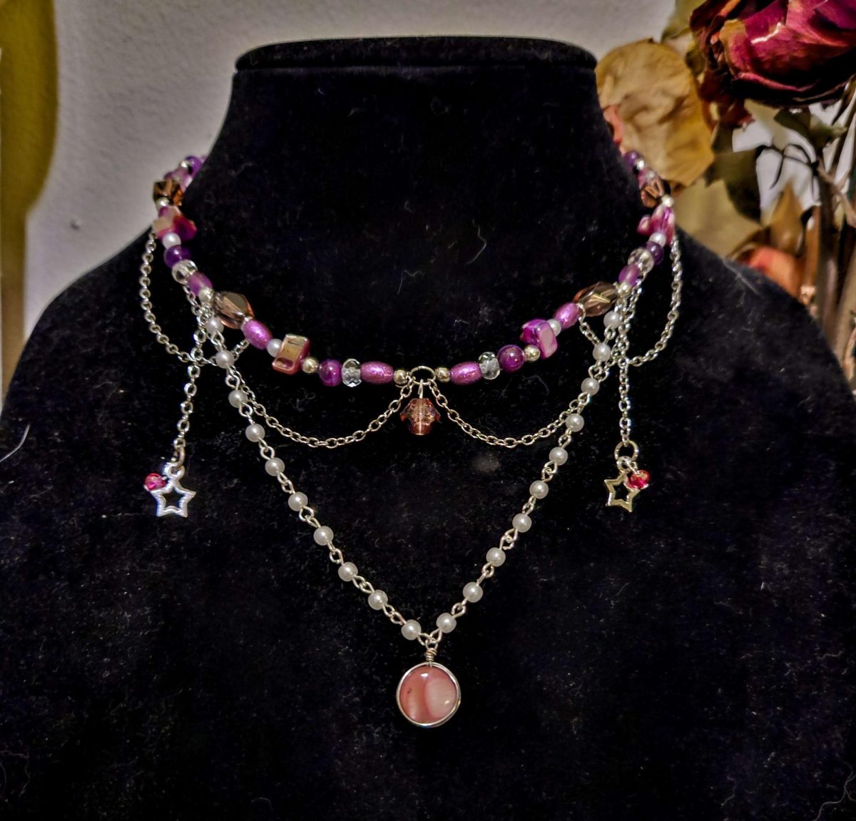 One of Owens complex, multi-stringed necklaces