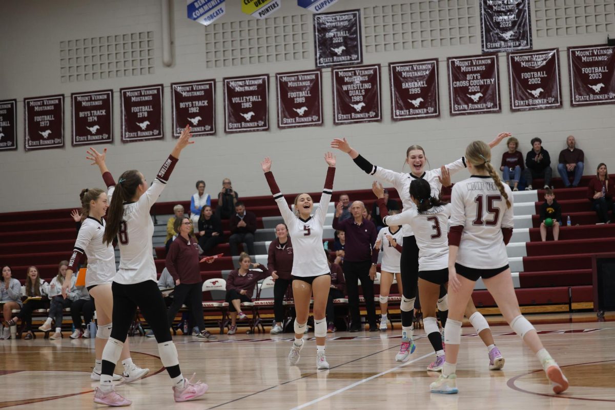 The team celebrates after the win. Mount Vernon beat Williamsburg 3-0. (25-9, 25-11, 25-17)