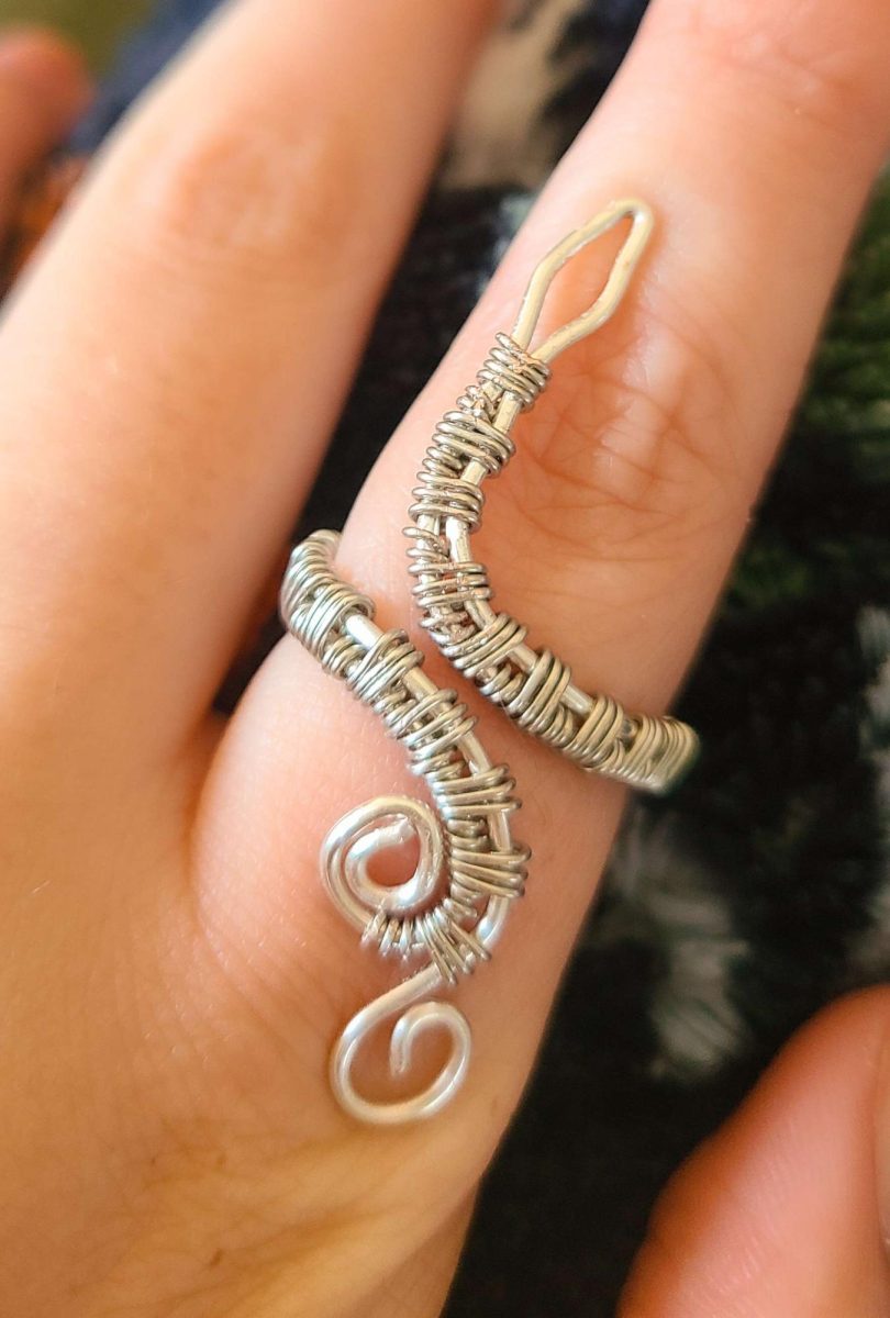 A snake ring with complex wire wrapping