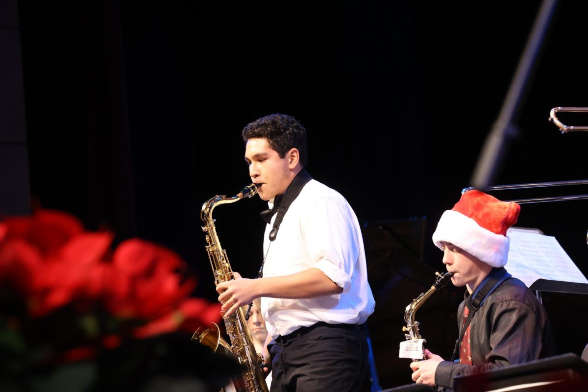 Freshman Jonathan Winkler performs his solo in Kick it Up on Dec. 17.