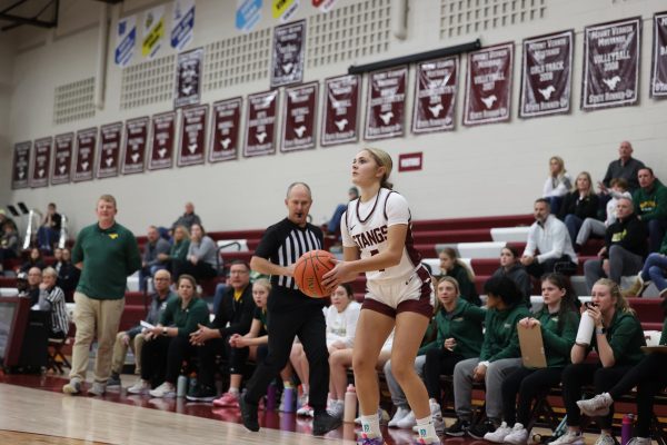 Junior Eryn Jacskon gets ready to shoot a wide open three. Mount Vernon played Dubuque Hempstead on Nov. 28, winning the game 65 - 39.