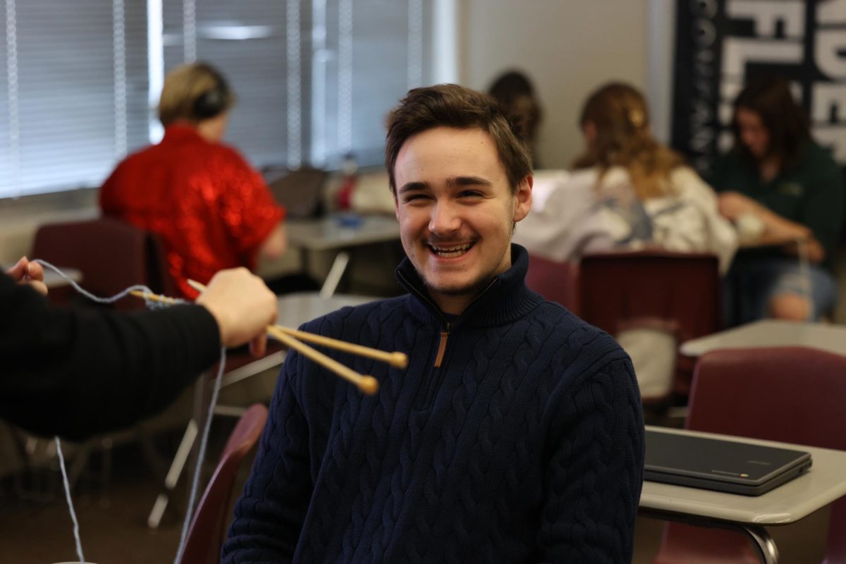 Sophomore Brighton Bybee smirks for the camera Jan. 3 in Stitching Together.