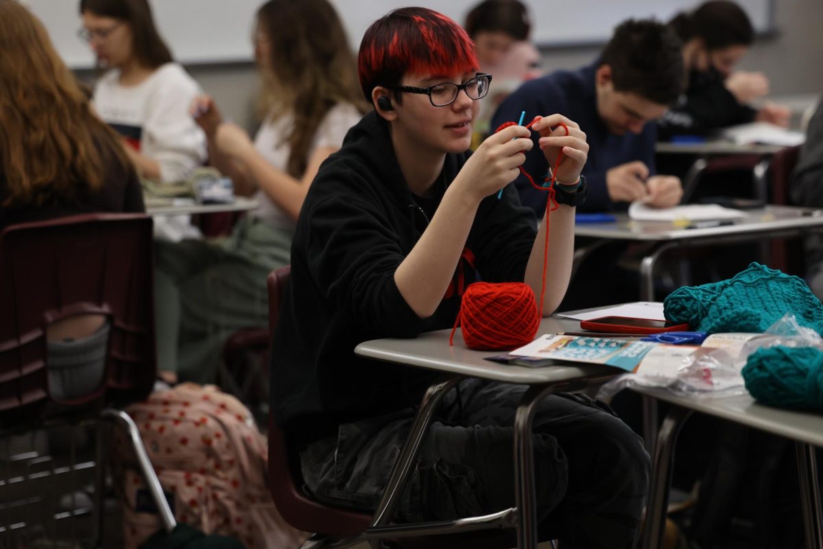 Junior Simon Gillespie starts their crotchet project Jan. 4 in the Stitching Together J-term.