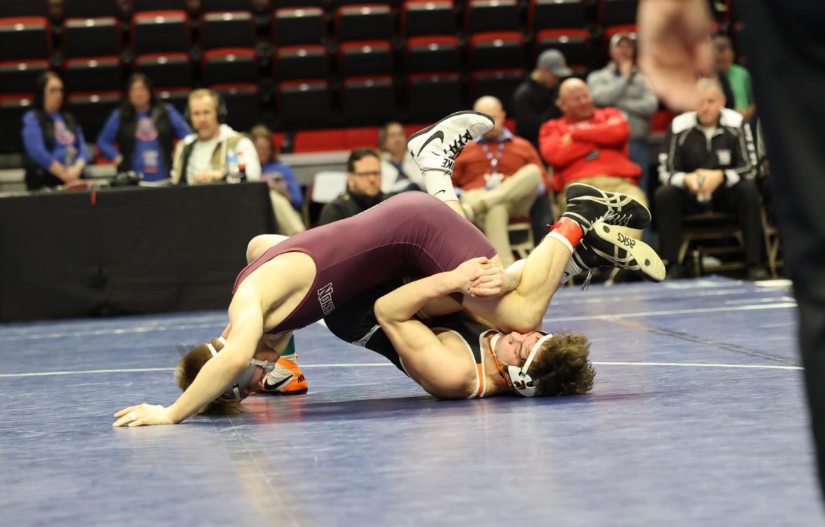 Sophomore Jase Jaspers tries to get a takedown in his semifinal match. 