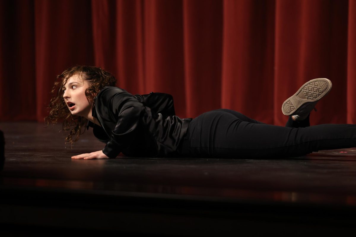 Senior Emily Patten performs her dramatic solo mime piece called ER Exorcism.