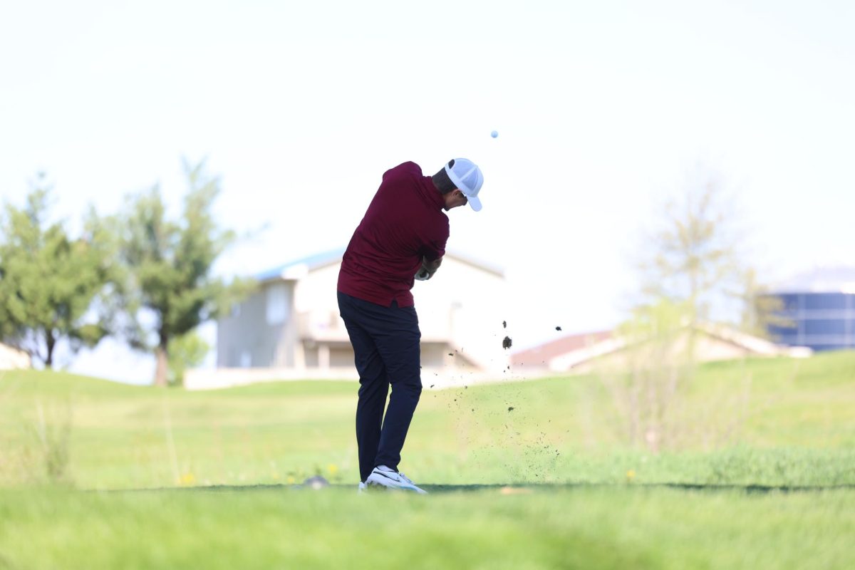 Sophomore Kellen Haverback tees off on the eighth hole at Wildcat Golf Course on May 6th during the WAMAC Conference meet. 