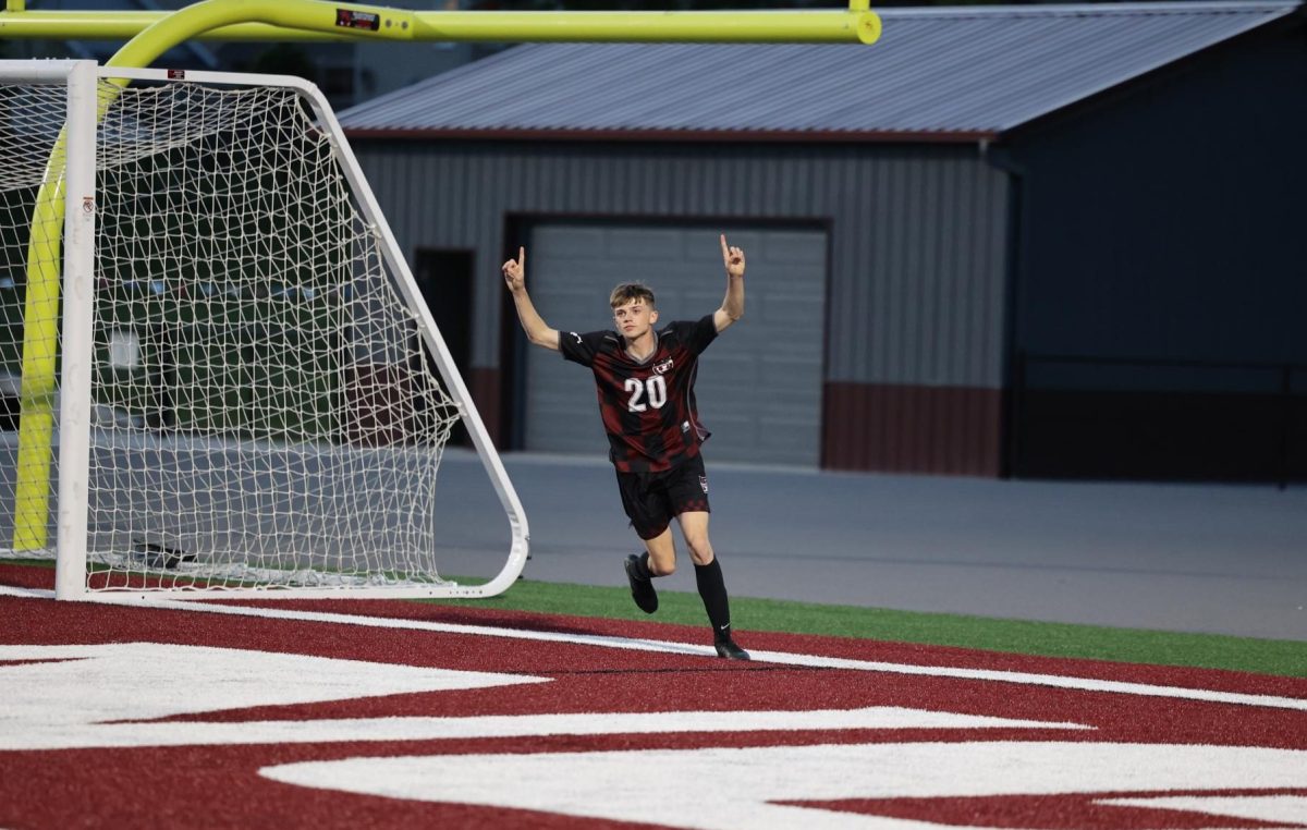 Senior from Lisbon, Matthew Mayhew (20), scores his first goal of the season on Senior Night against West Delaware on May 7th. The Mount Vernon boys soccer team won 6-0. 