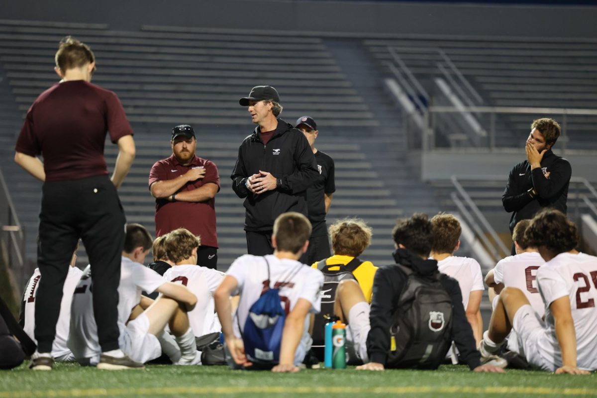 Head Coach Grosse addresses the team one final time on May 20 after their 5-1 loss to Cedar Rapids Washington. The Mount Vernon Boys Soccer team finished their season 7-9. 