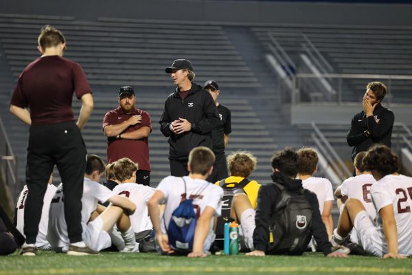 Head Coach Grosse addresses the team one final time on May 20 after their 5-1 loss to Cedar Rapids Washington. The Mount Vernon Boys Soccer team finished their season 7-9. 