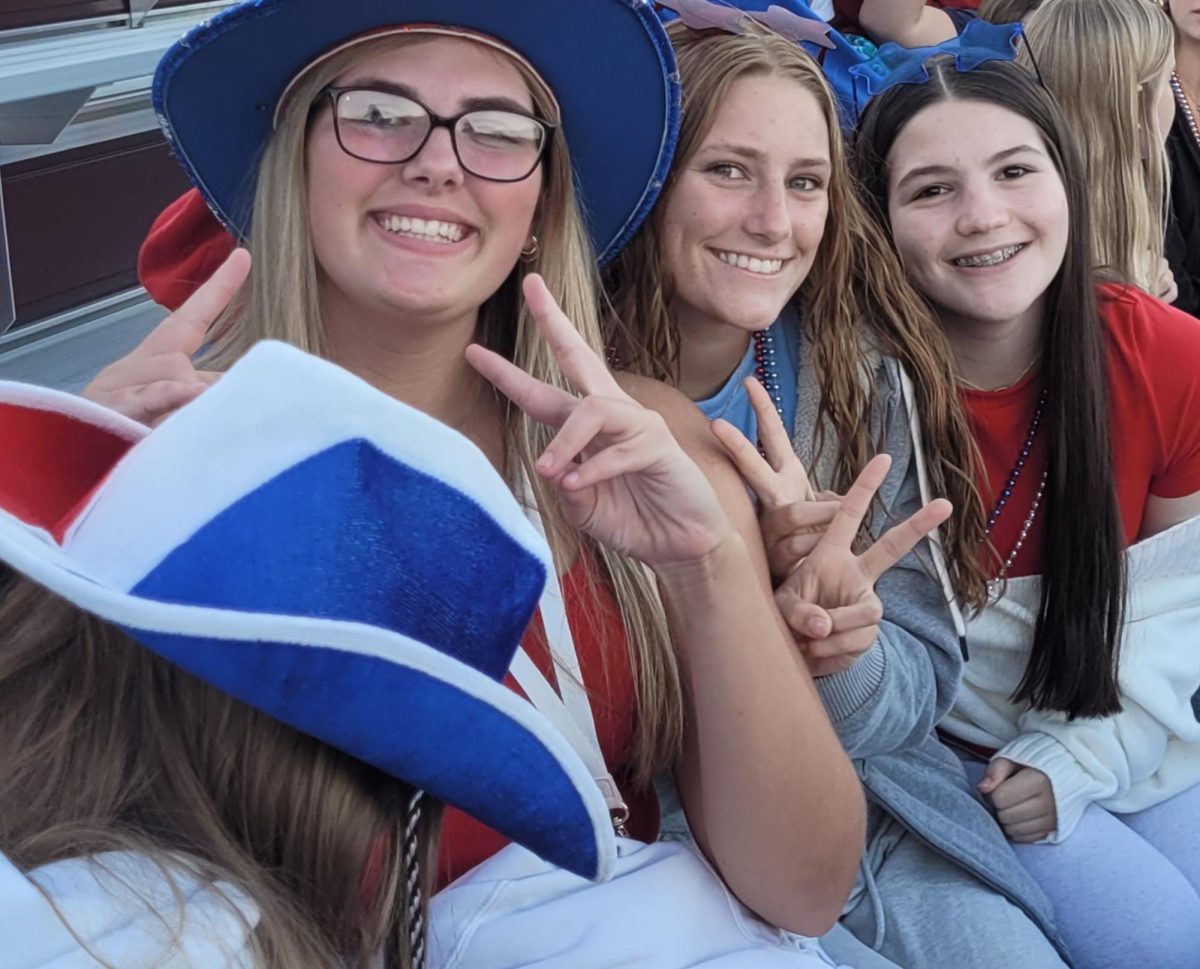 Freshman Star Wegner, Ella Wilson, and Bella Weber dressed up in their American wear to cheer on the Mount Vernon Mustangs. Sept 6