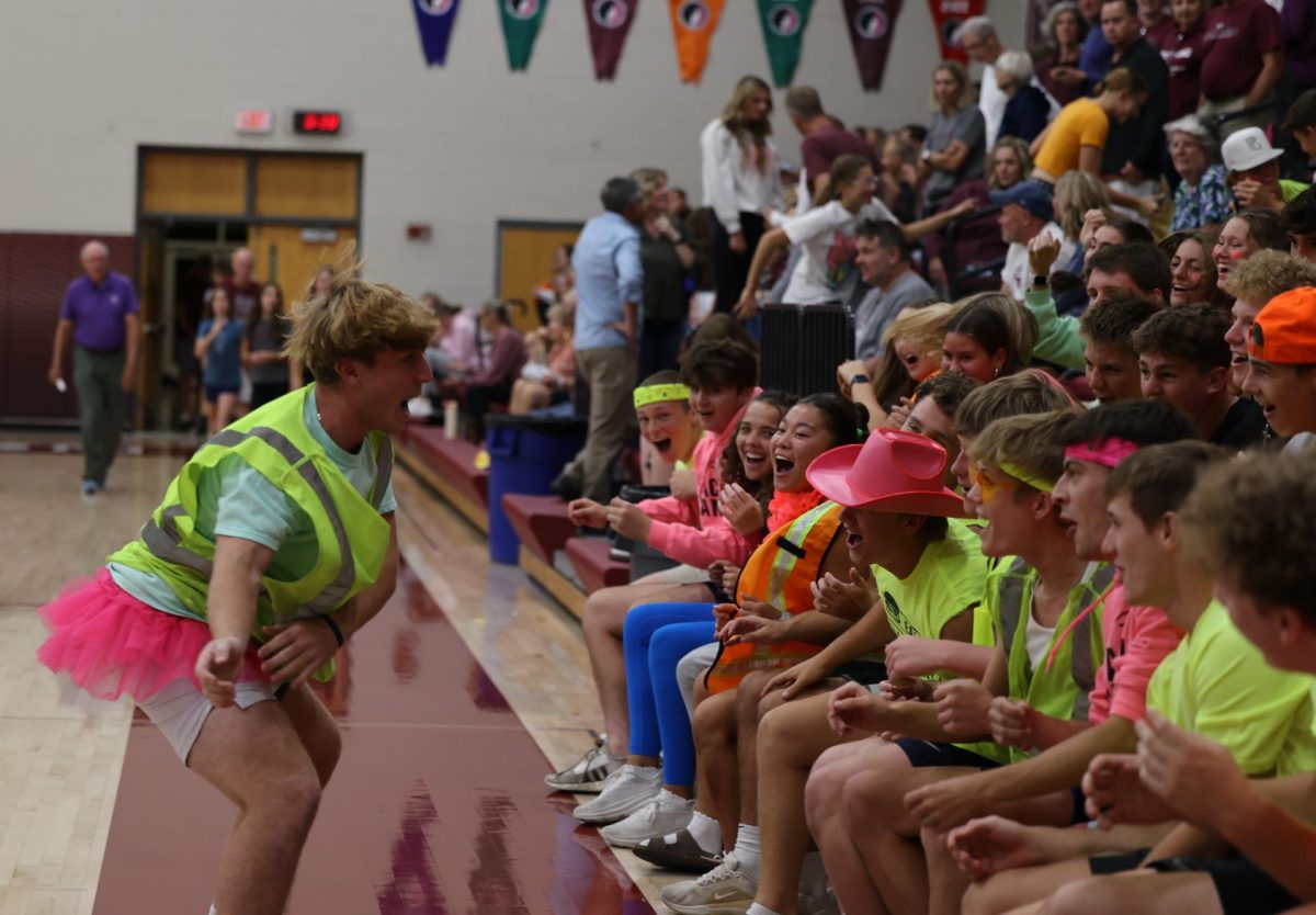 Senior Colin Bentley leads the Mount Vernon student section in an exciting cheer Sept. 10.