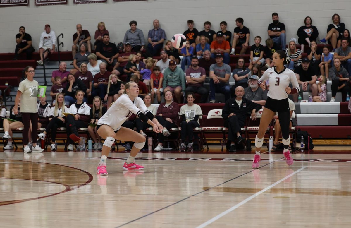 Senior Chloe Meester (16) gets low to bump pass the ball Sept. 10. 