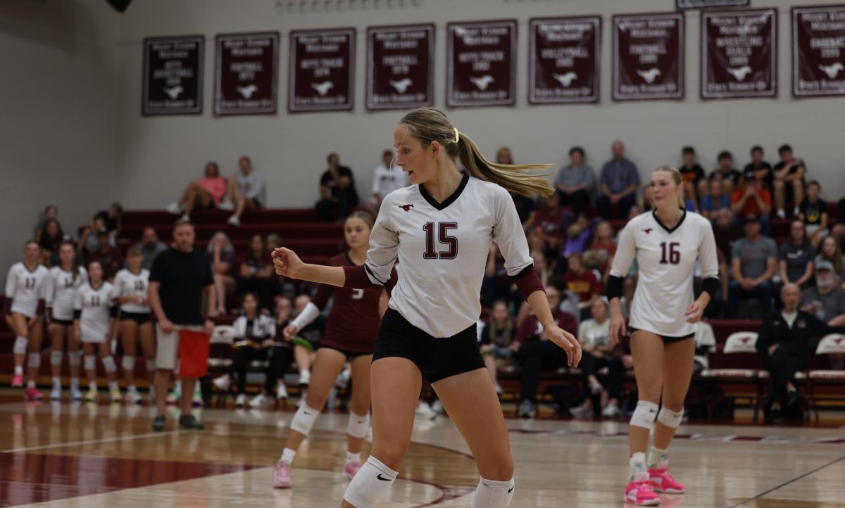 Senior Sydney Huber (15) follows to see if the ball goes out of bounds after Solon's attack Sept. 10.