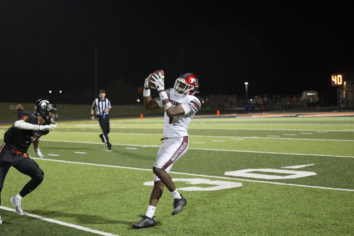 Senior Watson Krob catches a 65-yard TD pass Sept. 20. Mount Vernon lost to Solon 7-6.