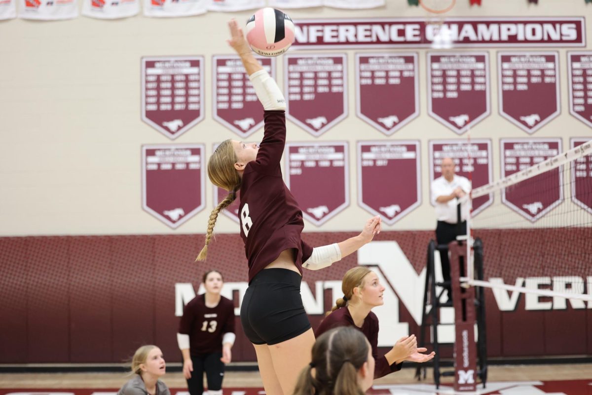 Freshman Annabelle Smith(8) hits ball back to CPU on Sept.24th.