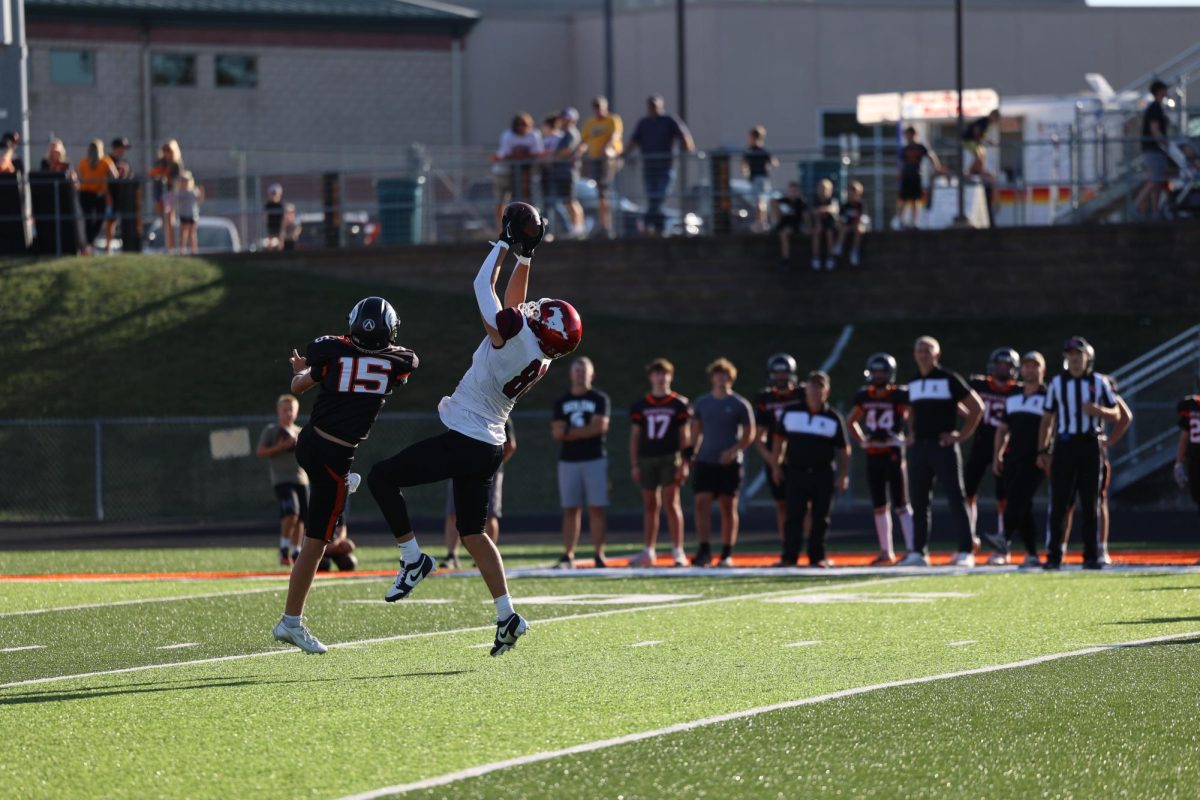 Jakob DeLany (88) catches the ball in the game against Solon Sept. 20. The Mustangs lost to Solon 28-7.