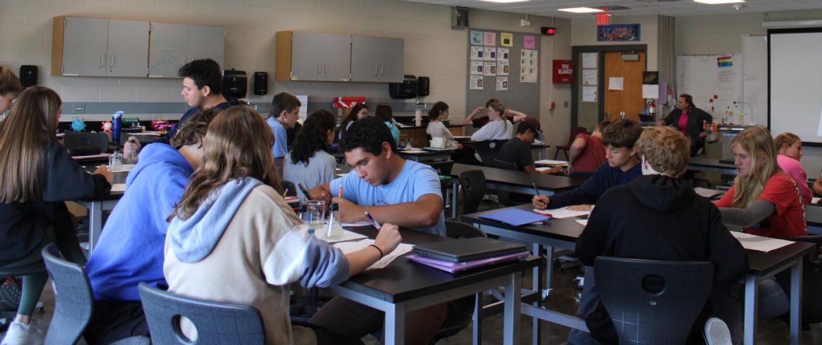 Science teacher Heather Allen's Honors Biology class is working hard on their assigned lab project, working on finding out whether each flask contains the same liquid. During the science methods investigation. Sept. 9. 