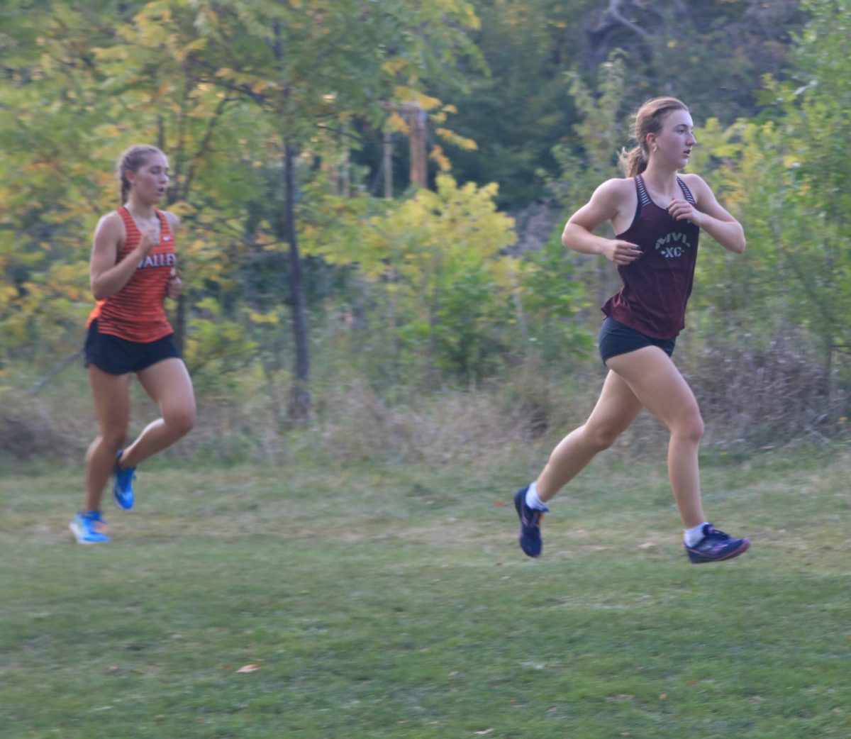 Sophomore Rose Pisarik runs at the 2 miles mark in the varsity race at the Ames meet Sept 5.  