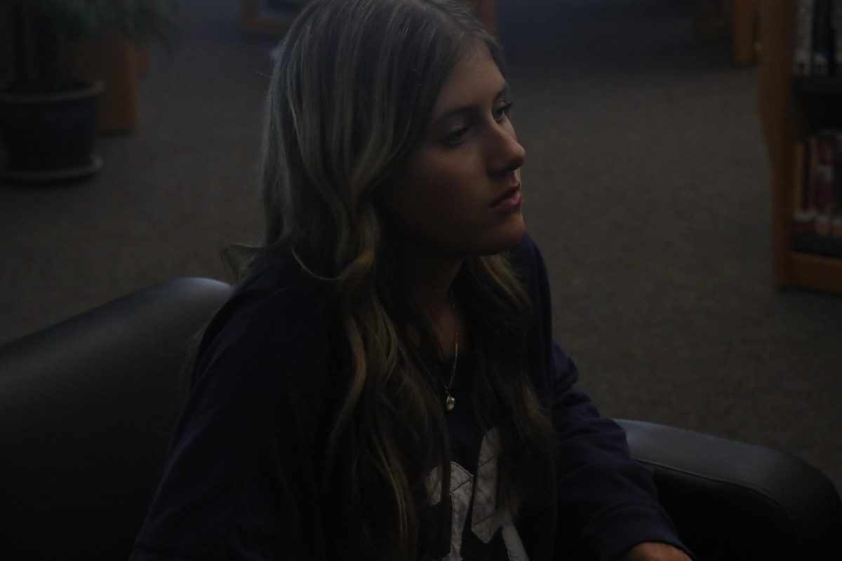 Sophomore Ayla Davis intently listens discussion in the library.