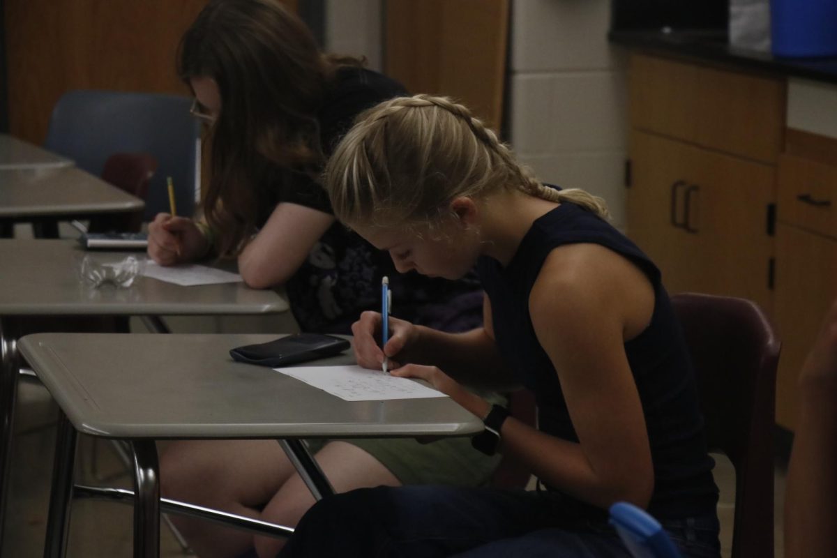 Freshman Hannah Morf, concentrates on algebra check-in in Mr. Roberts' class.