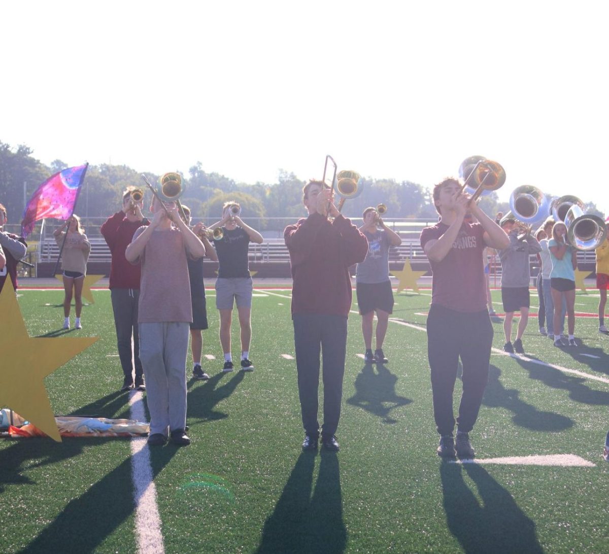 Junior Kevin Zehms plays trombone with freshmen Jack Bauer and Isaiah Hanson  Sept. 6.