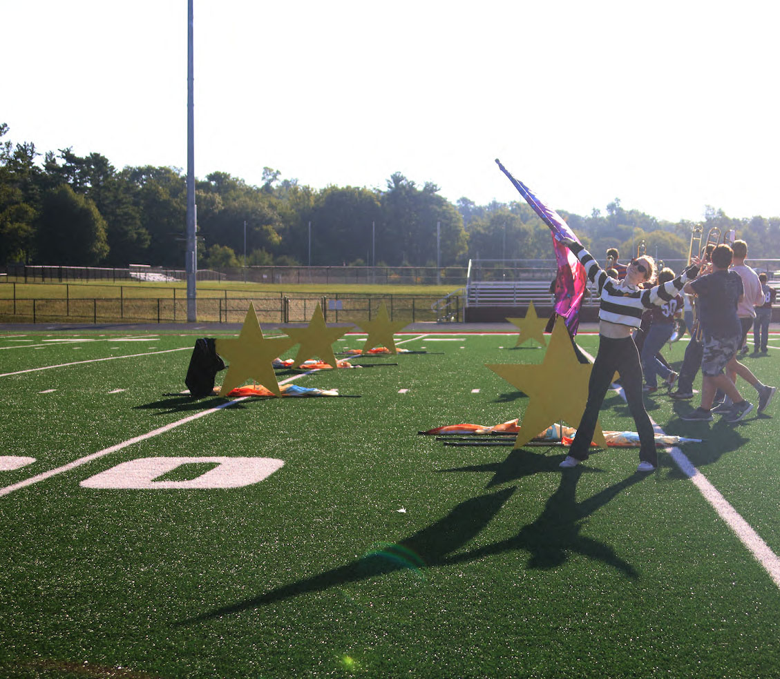 Junior Ingrid Morf smiles to the stands Sept. 6. 