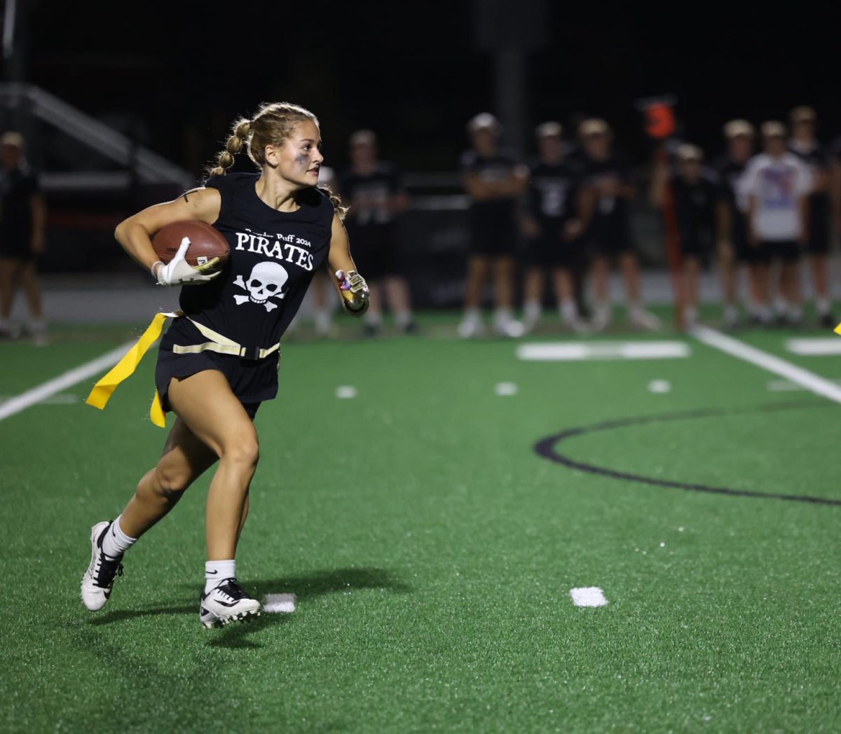 Junior Taylor Frank runs to the end zone Sept. 26.