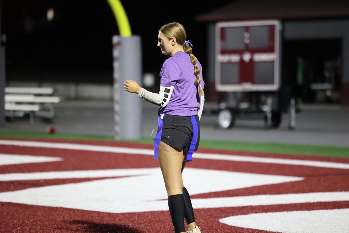 Sophomore Lucy Wishmeyer smiles to her team mates in the end zone  Sept. 26. 