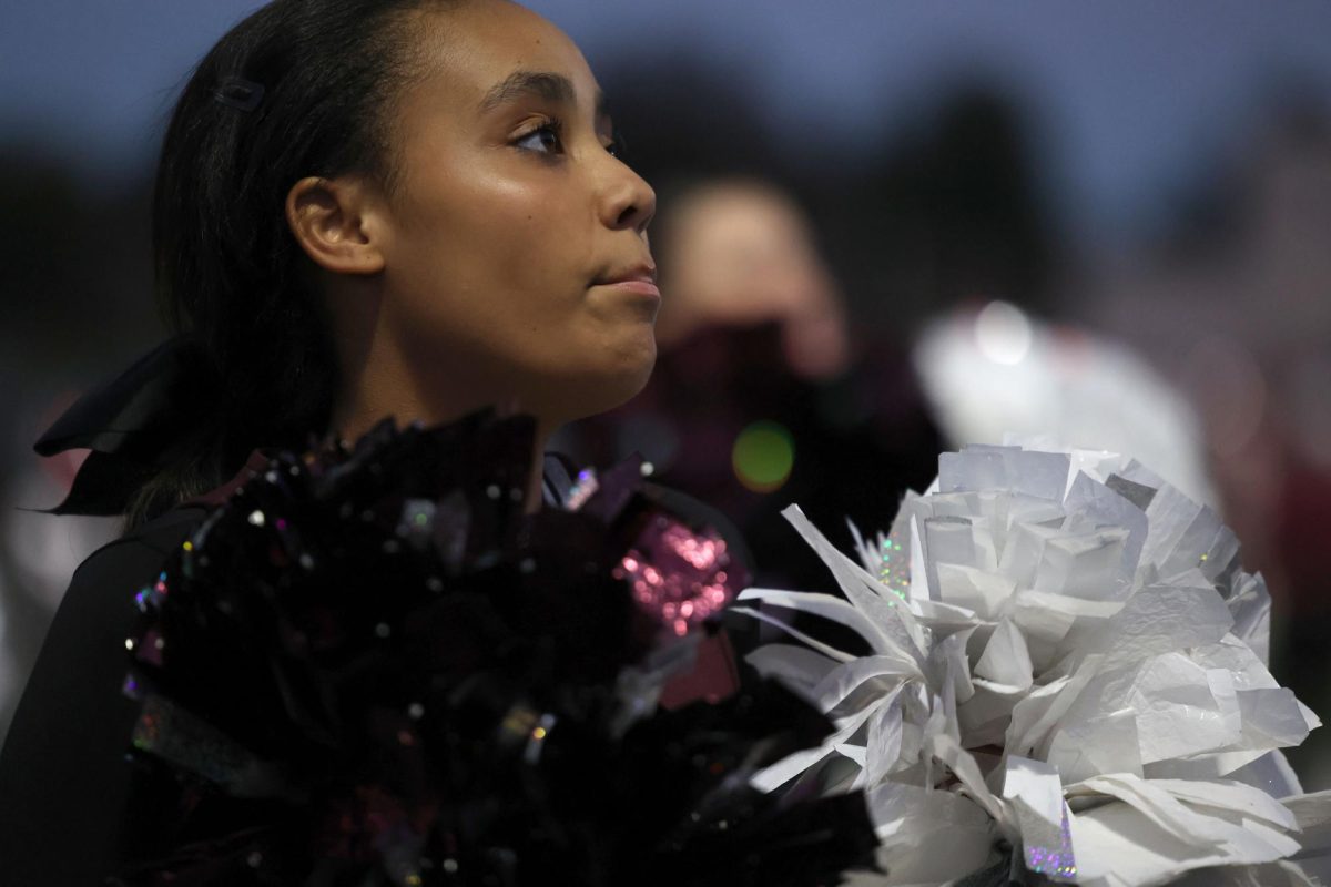 Mia Panos cheers at the game against Union Sept. 6. Mount Vernon beat Union 43-6.