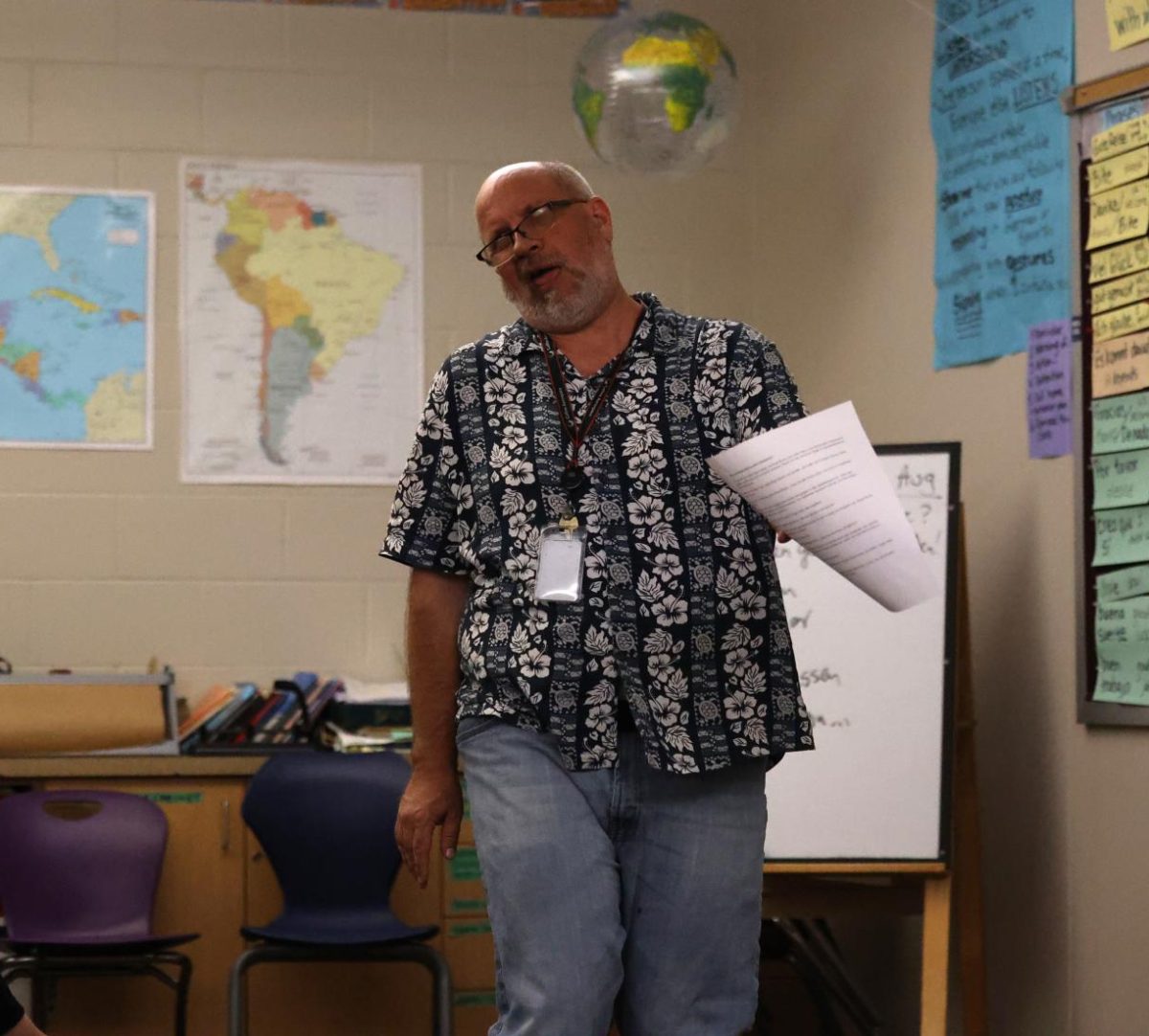 World language teacher Tom Wilkinson dramatically acts for a story created in his German 2 class on Aug. 28.