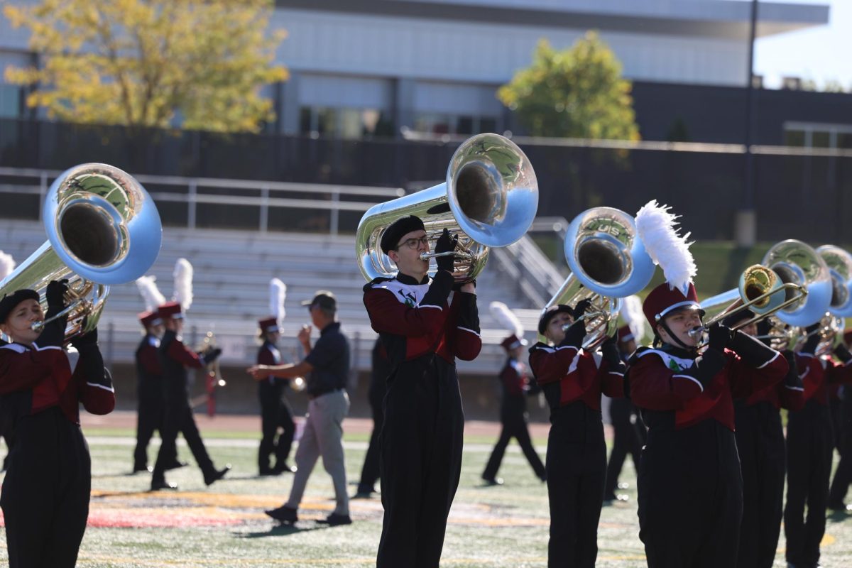 Junior Michael Covington skillfully performs during the Marching Mustang's show at the Sept. 28 competition. 