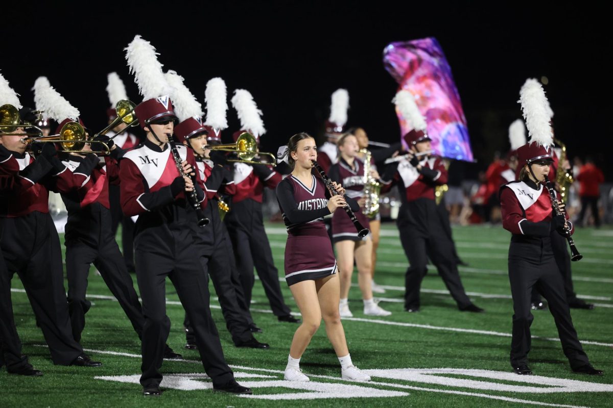 Sophomore Lyn Bauer performs with the Marching Mustangs on Oct. 11. 