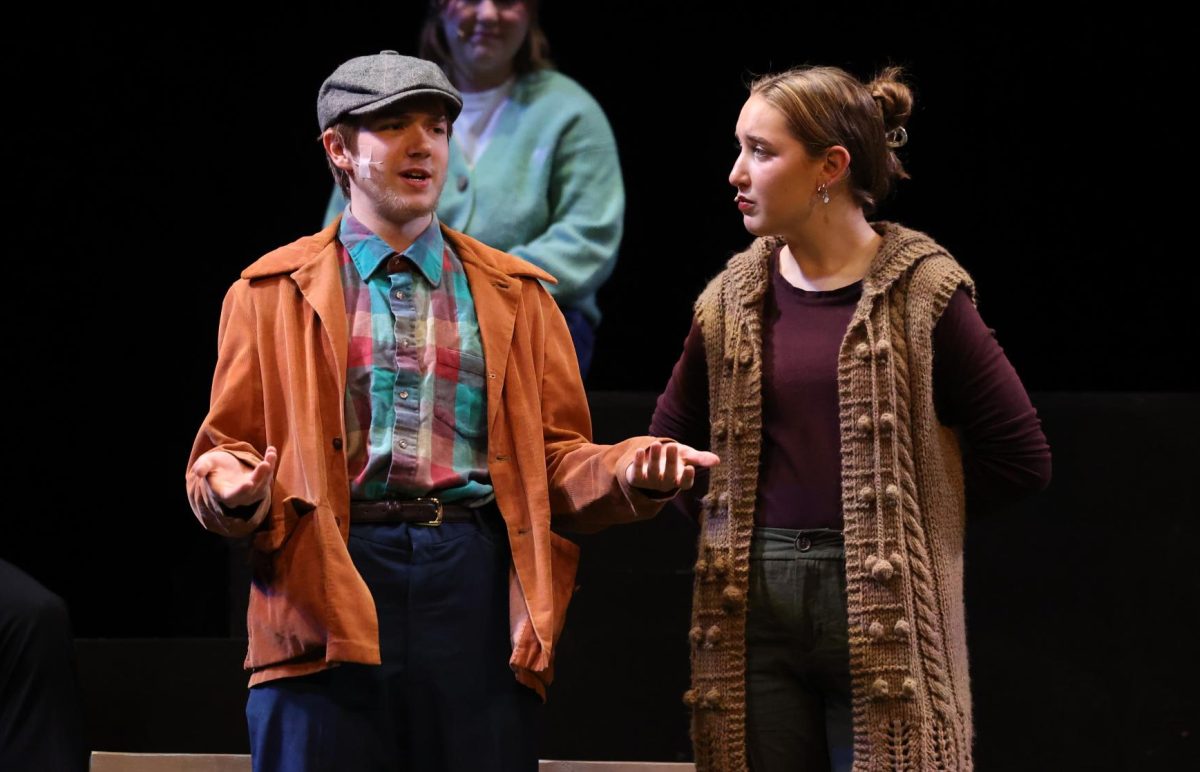 Sophomore Chester Rood as Darren and senior Bella Hasley as Georgia discuss Sandy Hook during the dress rehearsal on Nov. 7.