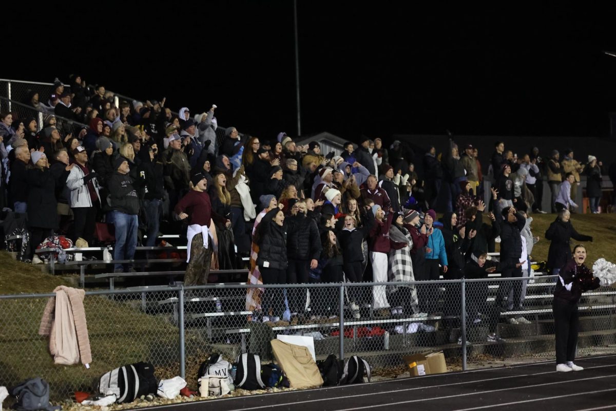 The MVHS student section cheer for the Mustangs.