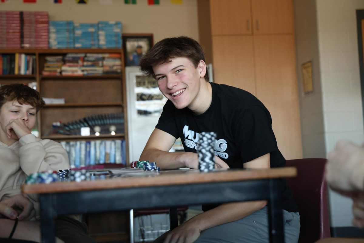 Sophomore Luke Rushford is having a great time while playing poker during his J-Term class, Digital Media.