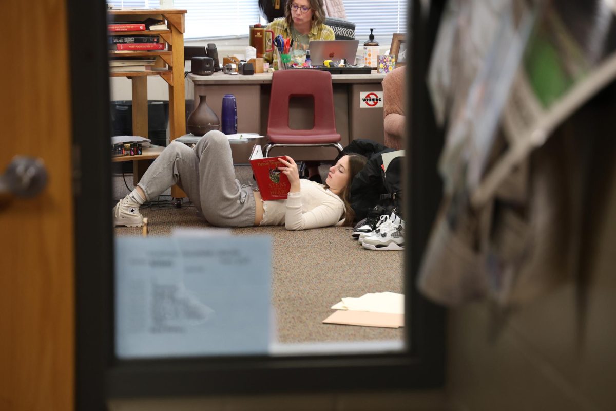 Senior Sarabell Steil reads he book during her Mindfulness J-Term class Jan. 7. 