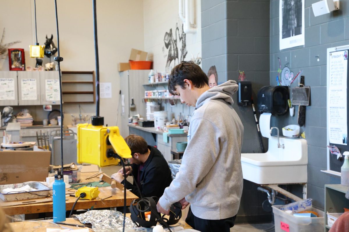 Junior Nolan Pownell works on his creation in his Sci-fi J-Term.  