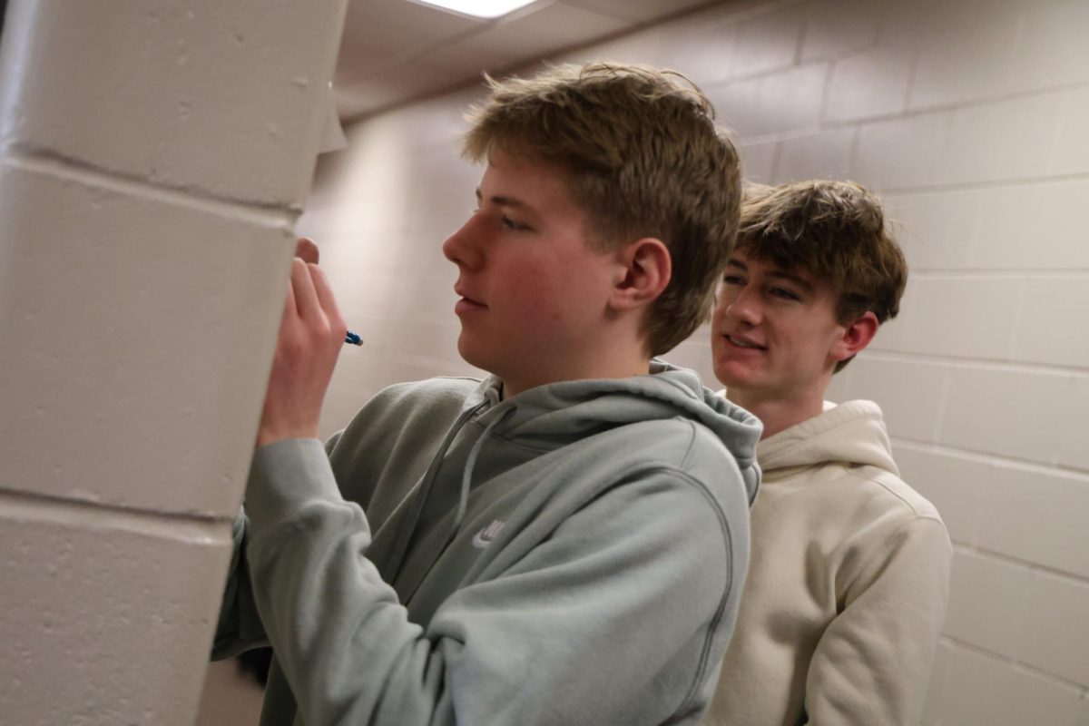 Sophmore Maddox Curran works on J-Term Data quest project while fellow Sophmore Cole McDermott observes. 